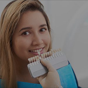 Woman trying dental veneers